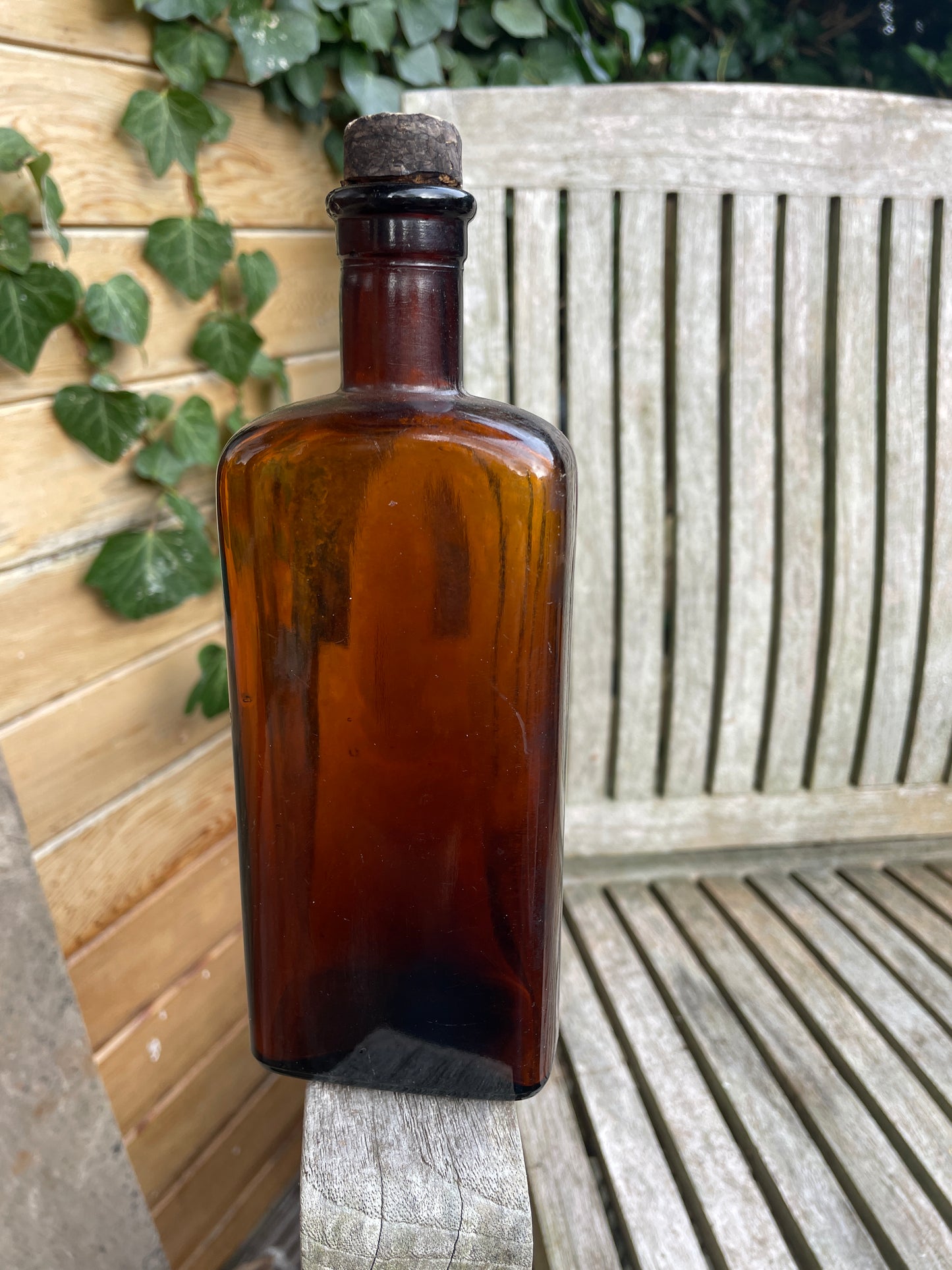 Antique brown glass with original cork GB 10 oz to base c1890