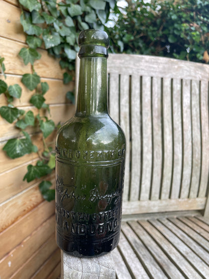 Antique green glass bottle Stephen Dunphy 111 Mostyn Street Llandudno North Wales c1900