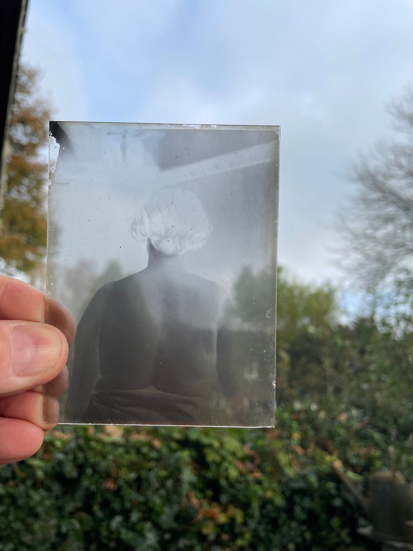 A collection of fifteen photographic glass plates c 1920 some risqué