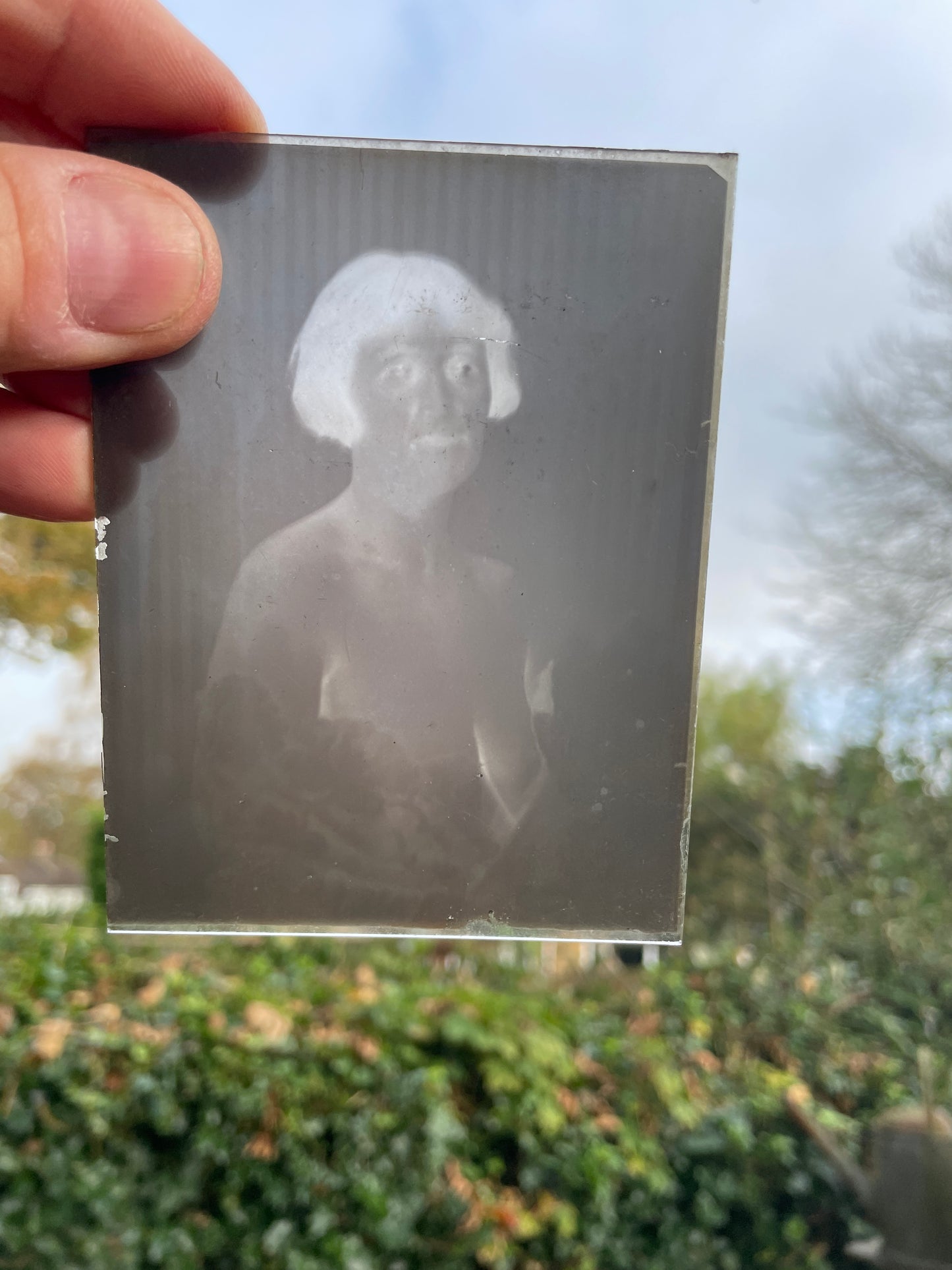 A collection of fifteen photographic glass plates c 1920 some risqué