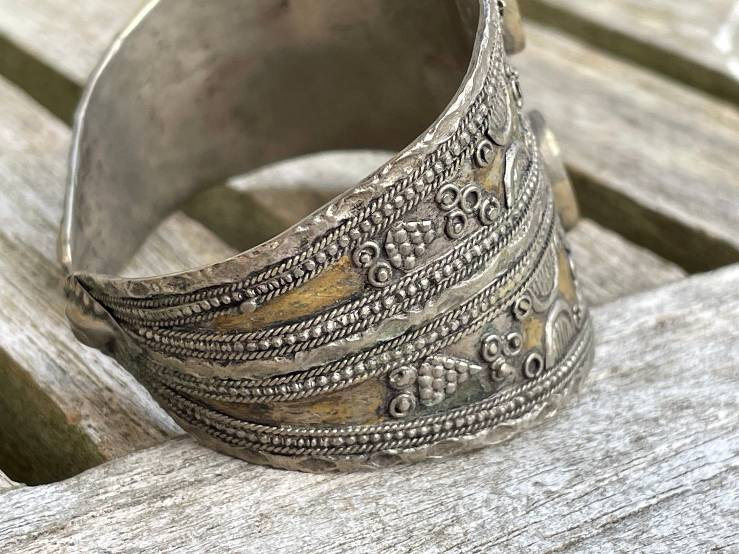 Vintage Kazakh white metal cuff bracelet with two orangey red agate stones