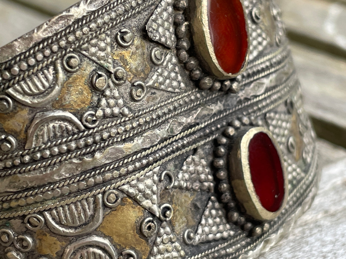 Vintage Kazakh white metal cuff bracelet with two orangey red agate stones