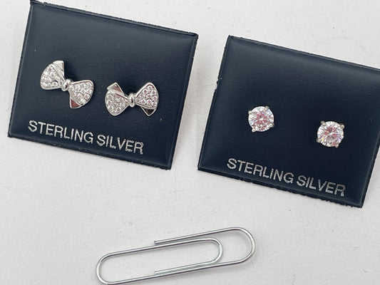 Two Pairs of Sterling Silver Stud Earrings, Modern Classic, Bow Tie and Round Solitaire Stones