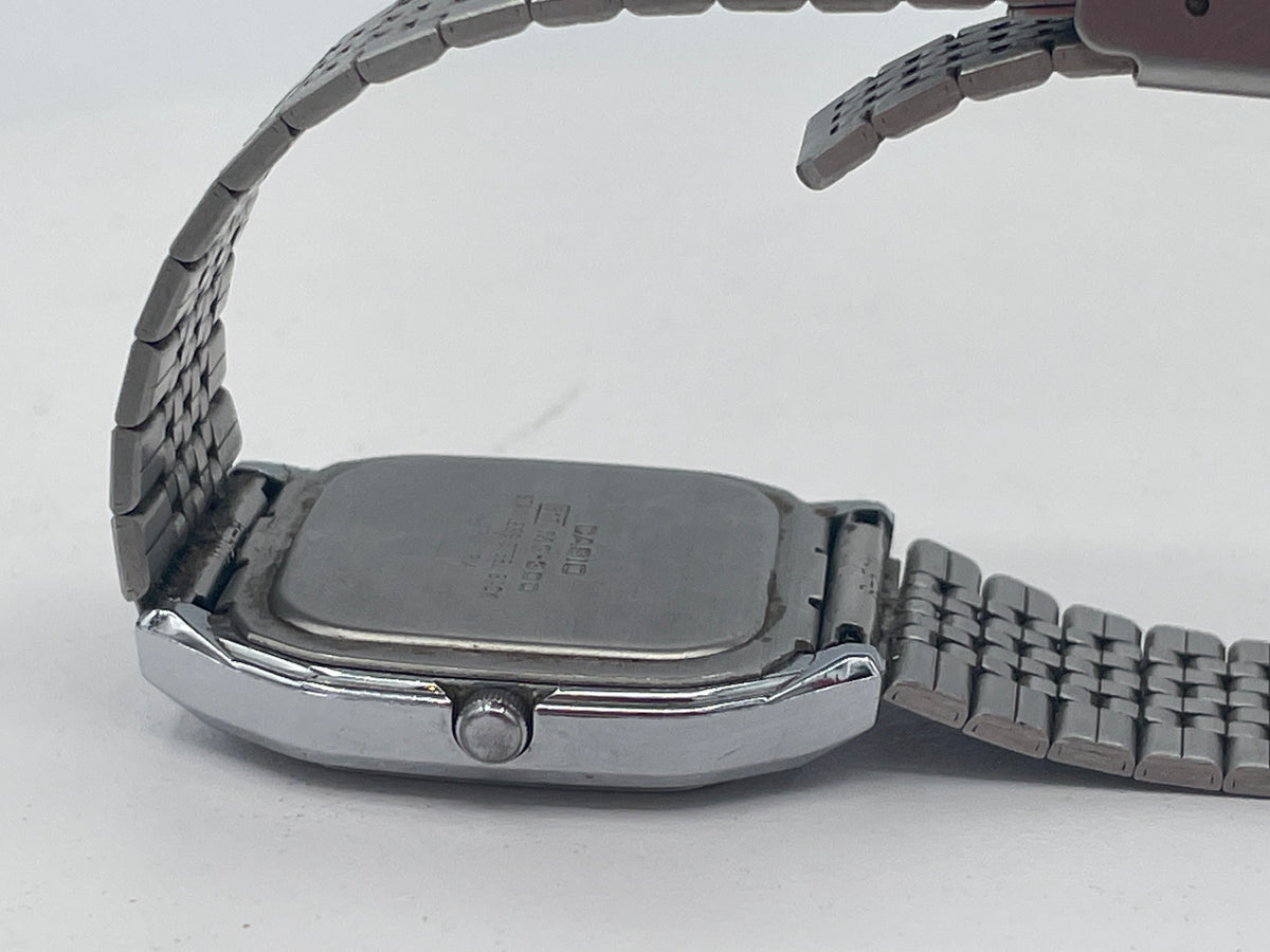 Vintage 1980s Casio MQ-300 Quartz Watch - 32mm Black Dial Stainless Steel Retro Watch