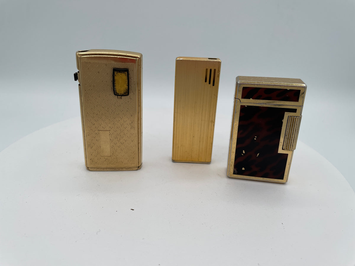 Vintage Trio of Collectible Pocket Lighters: Ronson Varaflame, Win 3000, and M-2500 Piezo Electric – Mid-to-Late 20th Century