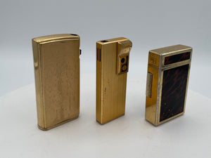 Vintage Trio of Collectible Pocket Lighters: Ronson Varaflame, Win 3000, and M-2500 Piezo Electric – Mid-to-Late 20th Century