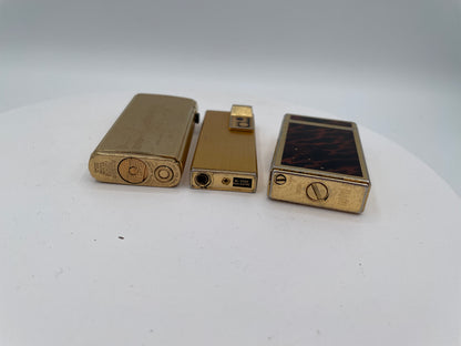 Vintage Trio of Collectible Pocket Lighters: Ronson Varaflame, Win 3000, and M-2500 Piezo Electric – Mid-to-Late 20th Century