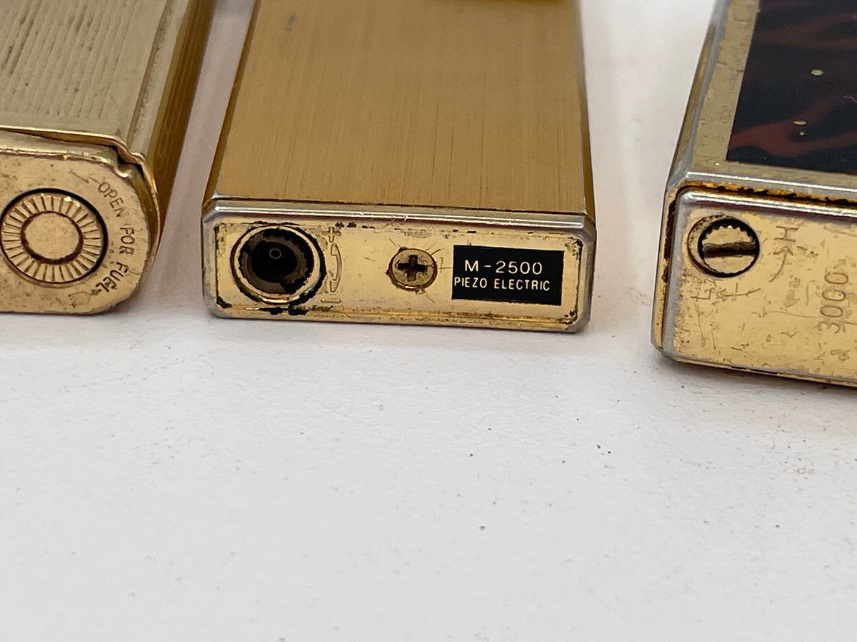 Vintage Trio of Collectible Pocket Lighters: Ronson Varaflame, Win 3000, and M-2500 Piezo Electric – Mid-to-Late 20th Century