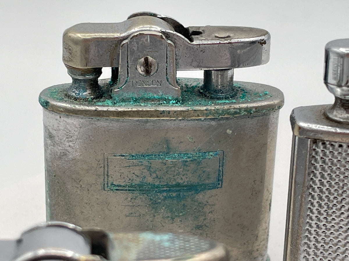 Vintage Sextet of Collectible Pocket Lighters: Ronson, Sim, and Marilyn Monroe Champ – Mid-20th Century & Modern