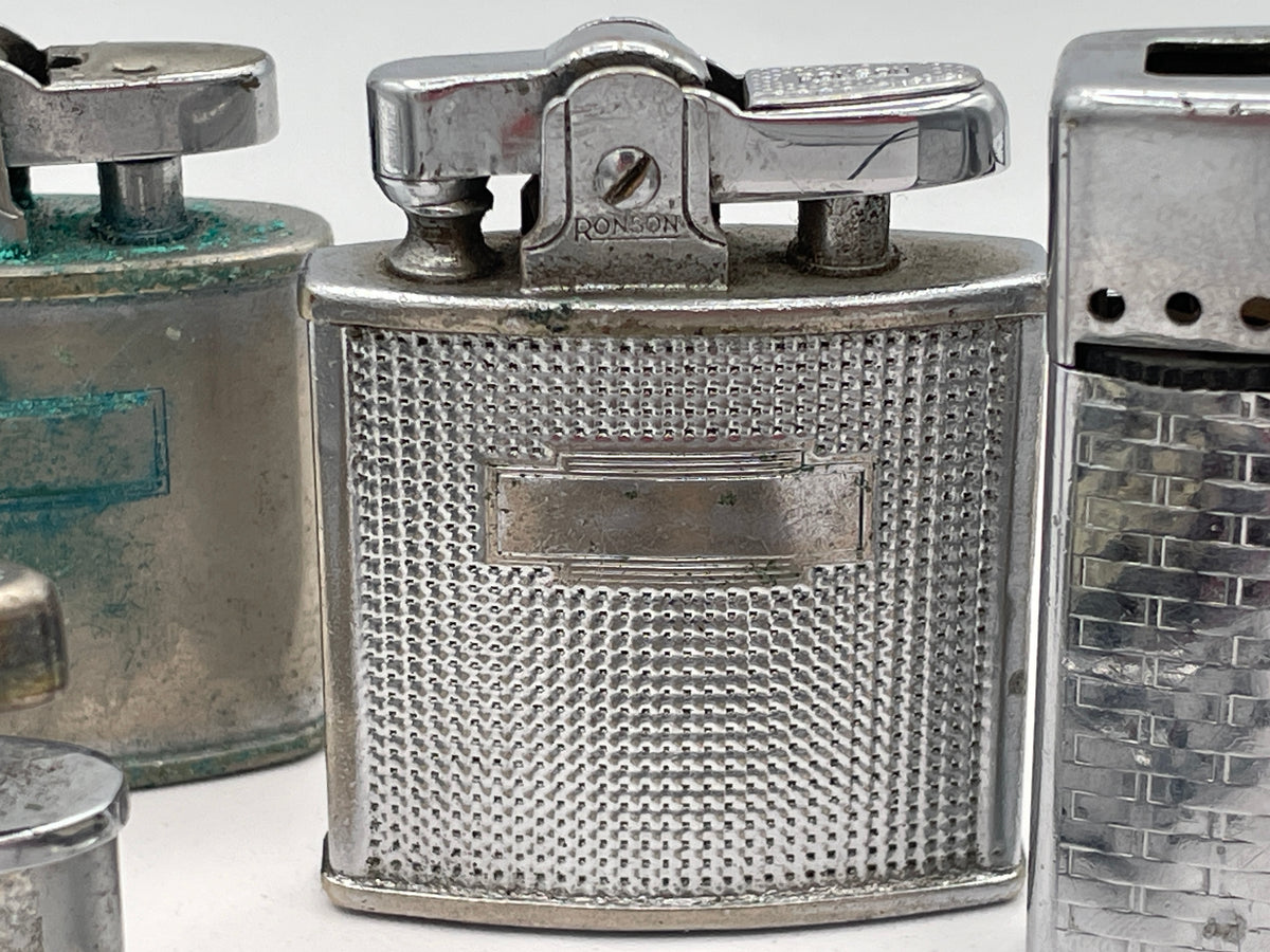 Vintage Sextet of Collectible Pocket Lighters: Ronson, Sim, and Marilyn Monroe Champ – Mid-20th Century & Modern