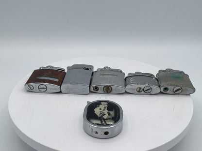 Vintage Sextet of Collectible Pocket Lighters: Ronson, Sim, and Marilyn Monroe Champ – Mid-20th Century & Modern