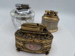 Vintage Trio of Table Lighters: Rolstar Brass, Crystal Cut Glass, and Ornate Petit Point Tapestry – Mid-20th Century