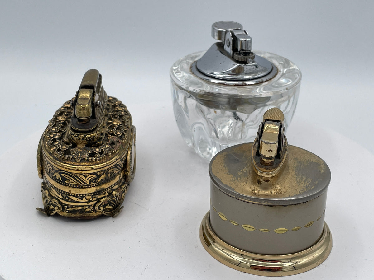 Vintage Trio of Table Lighters: Rolstar Brass, Crystal Cut Glass, and Ornate Petit Point Tapestry – Mid-20th Century