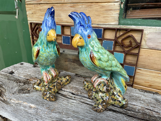 Pair of antique continental faience signed ceramic parakeets 26cm tall