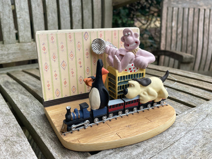 Vintage Wallace and Gromit Ornament by C and T.M. depicting train chase scene