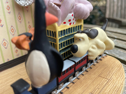 Vintage Wallace and Gromit Ornament by C and T.M. depicting train chase scene