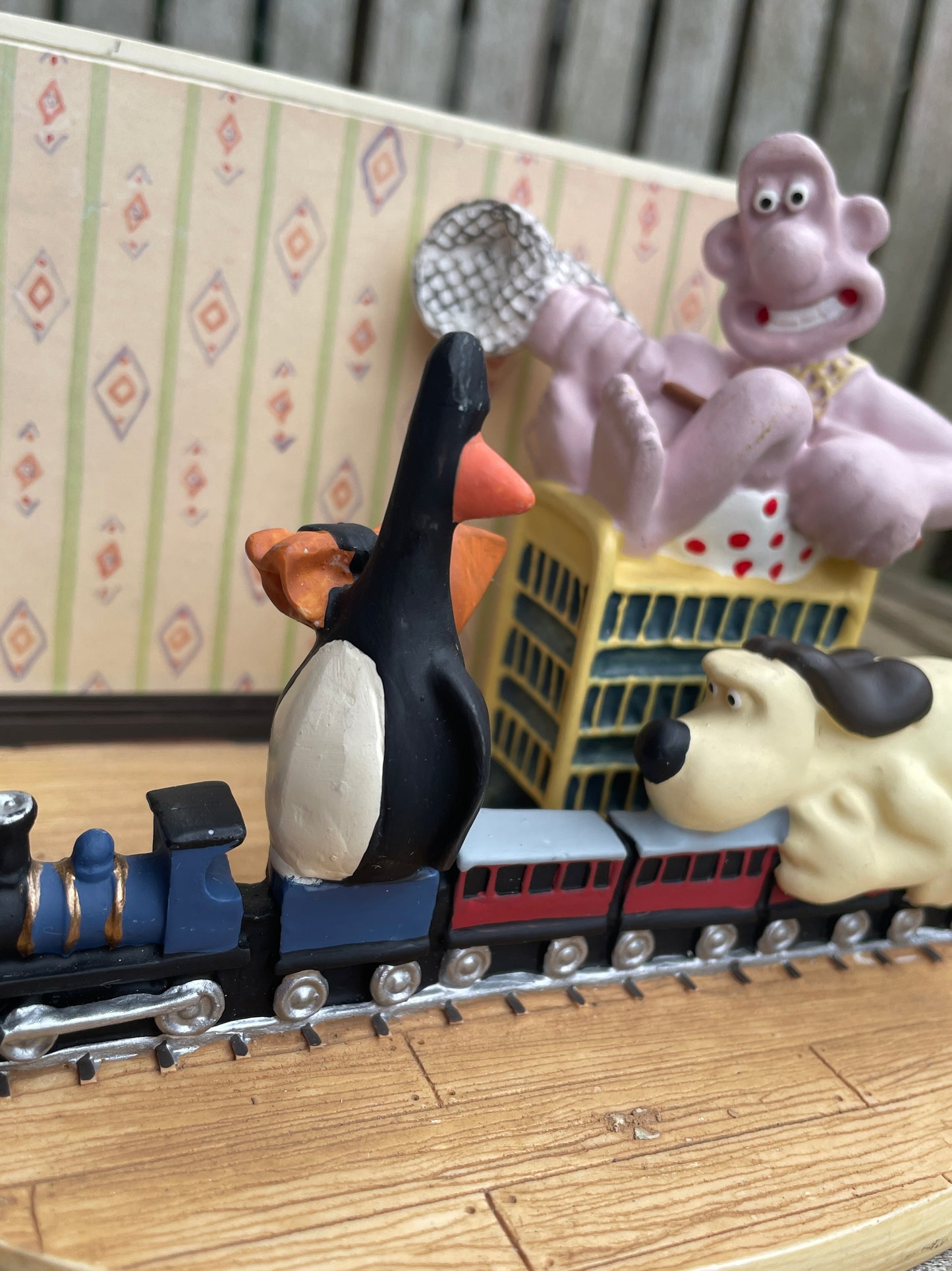 Vintage Wallace and Gromit Ornament by C and T.M. depicting train chase scene