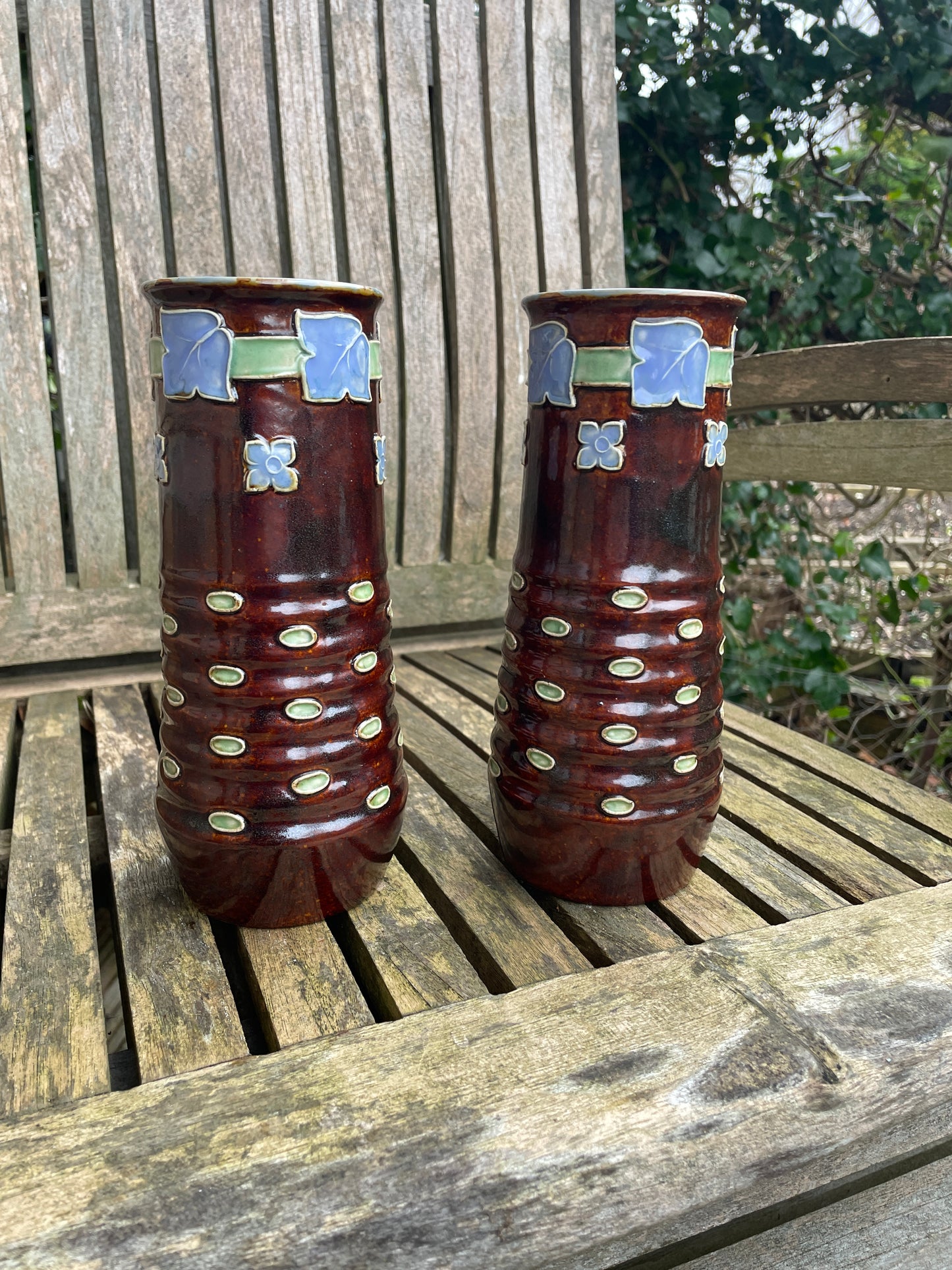 Pair Royal Doulton 19th century stoneware vases signed by Florrie Jones 21cm tall