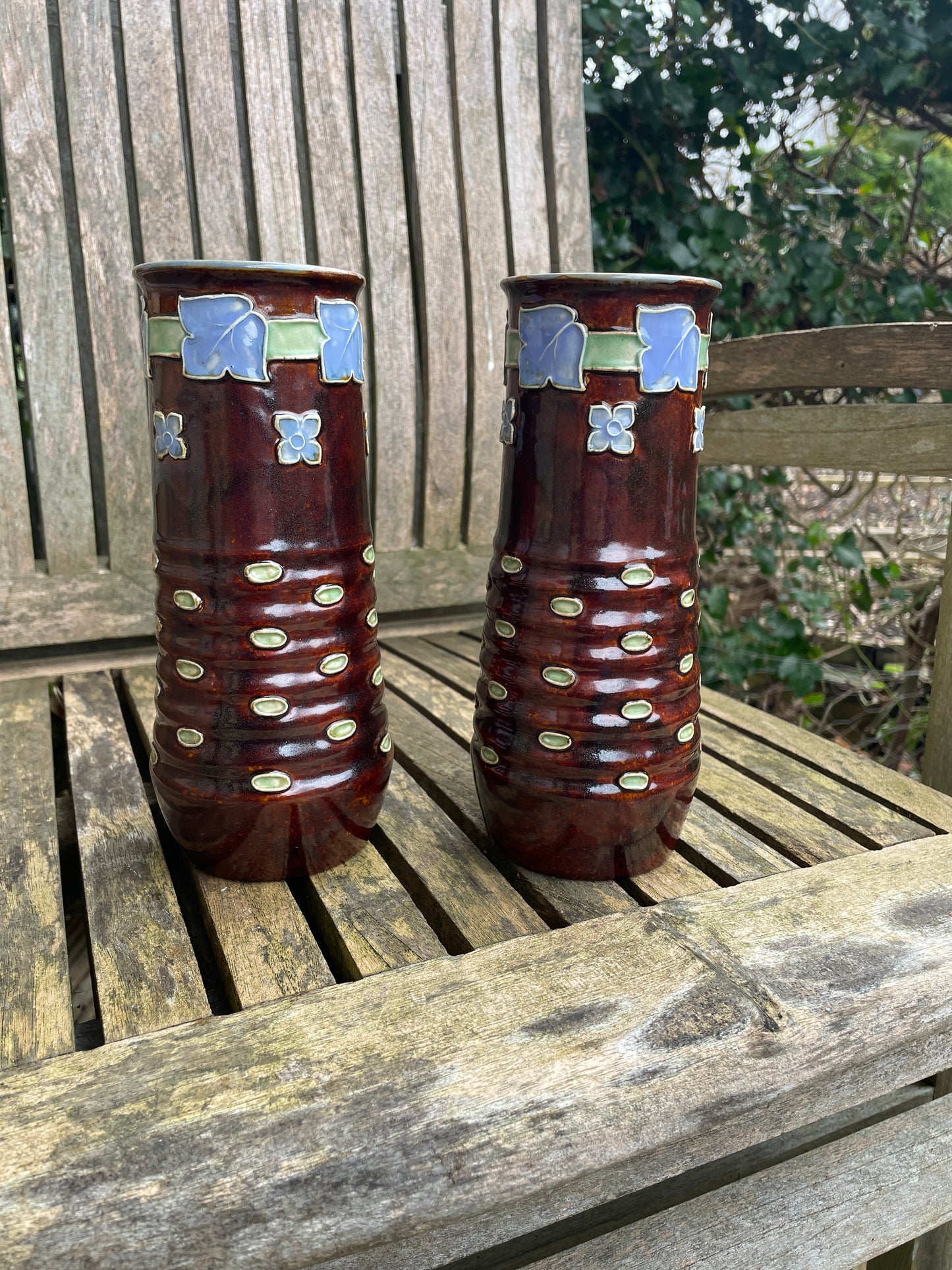 Pair Royal Doulton 19th century stoneware vases signed by Florrie Jones 21cm tall