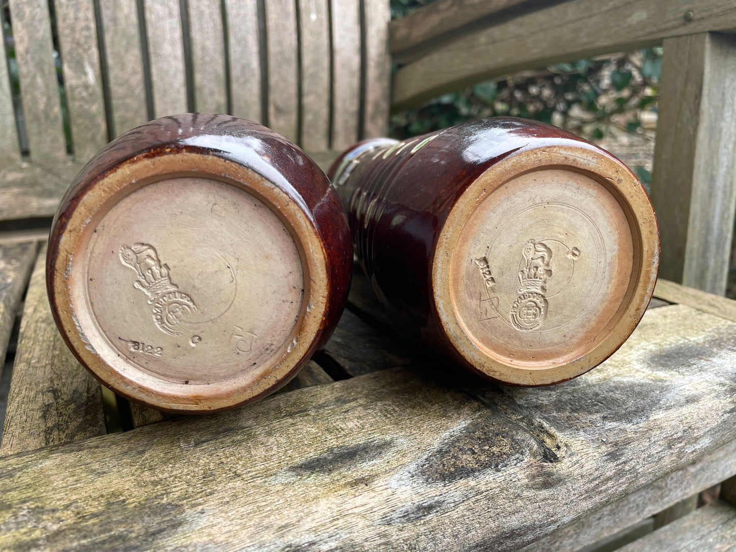 Pair Royal Doulton 19th century stoneware vases signed by Florrie Jones 21cm tall