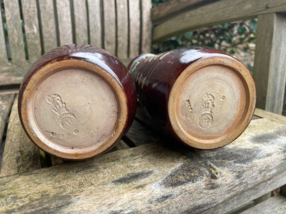 Pair Royal Doulton 19th century stoneware vases signed by Florrie Jones 21cm tall