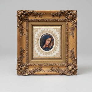 Antique watercolour miniature on ceramic cushion frame surround mounted in a giltwood and gesso decorated frame