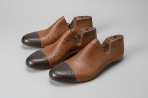 Antique Cobbler's wooden shoe lasts or formers with original leather patches and metal soles