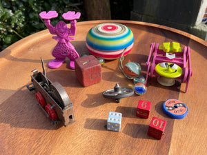 Seventies toy collection, Yo-Yo, Wall Walker,  stacking Clown, clockwork train ,marbles, spinning top