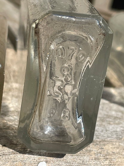 six antique and vintage clear glass bottles tallest  - Sloan's Liniment example 15cm
