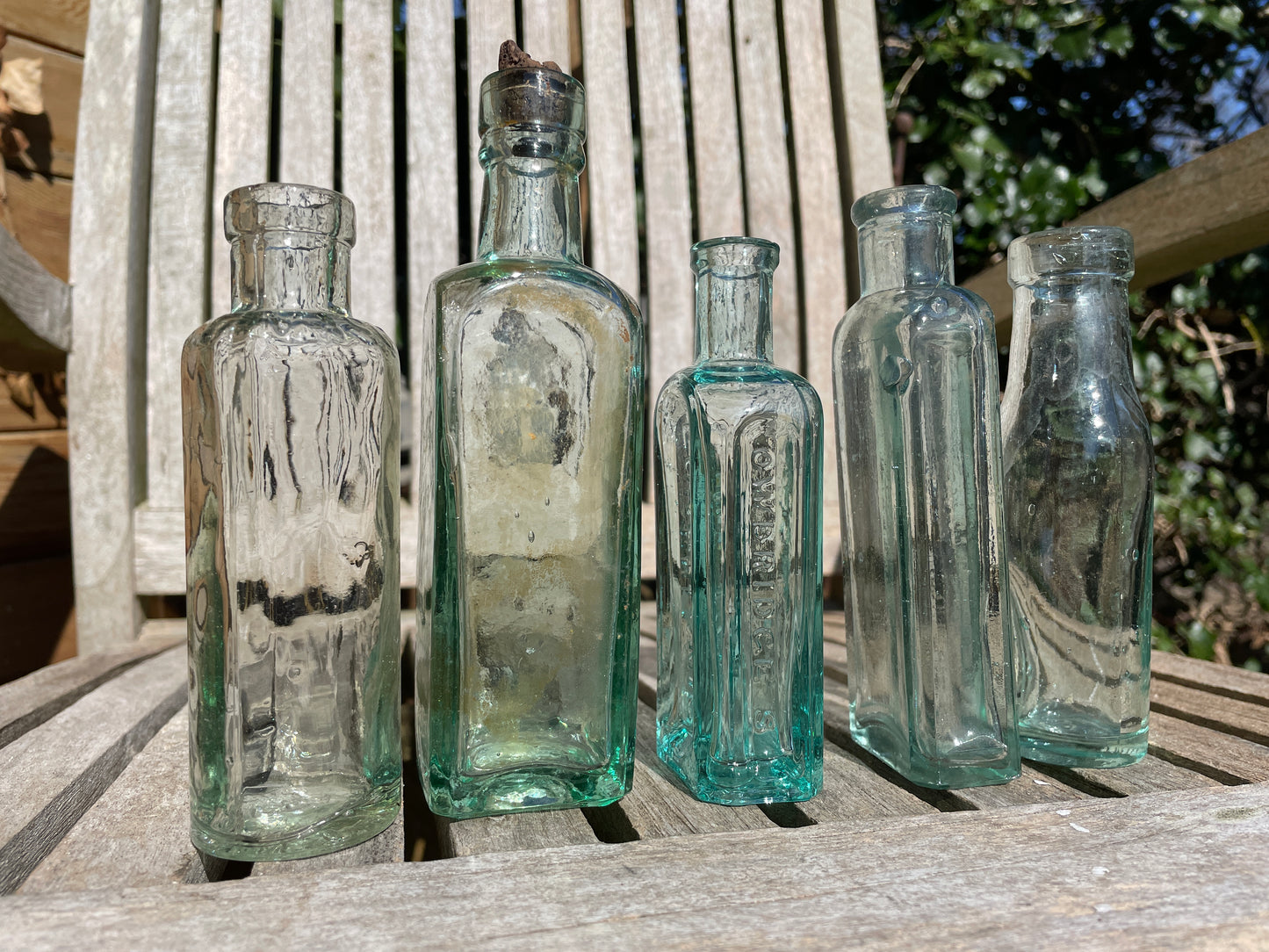 Five Antique and vintage small bottles incl. Masons Extract and Owbridge's Lung Tonic Hull examples
