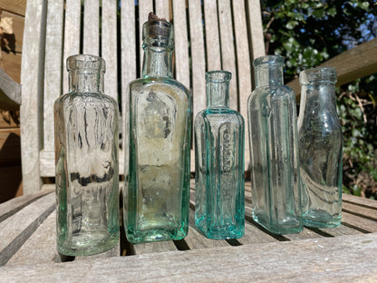 Five Antique and vintage small bottles incl. Masons Extract and Owbridge's Lung Tonic Hull examples