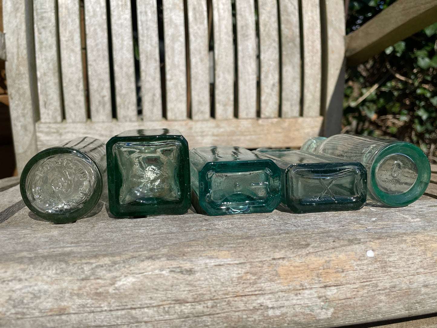 Five Antique and vintage small bottles incl. Masons Extract and Owbridge's Lung Tonic Hull examples