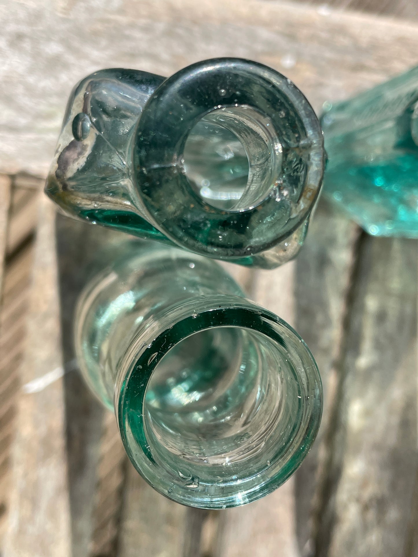 Five Antique and vintage small bottles incl. Masons Extract and Owbridge's Lung Tonic Hull examples