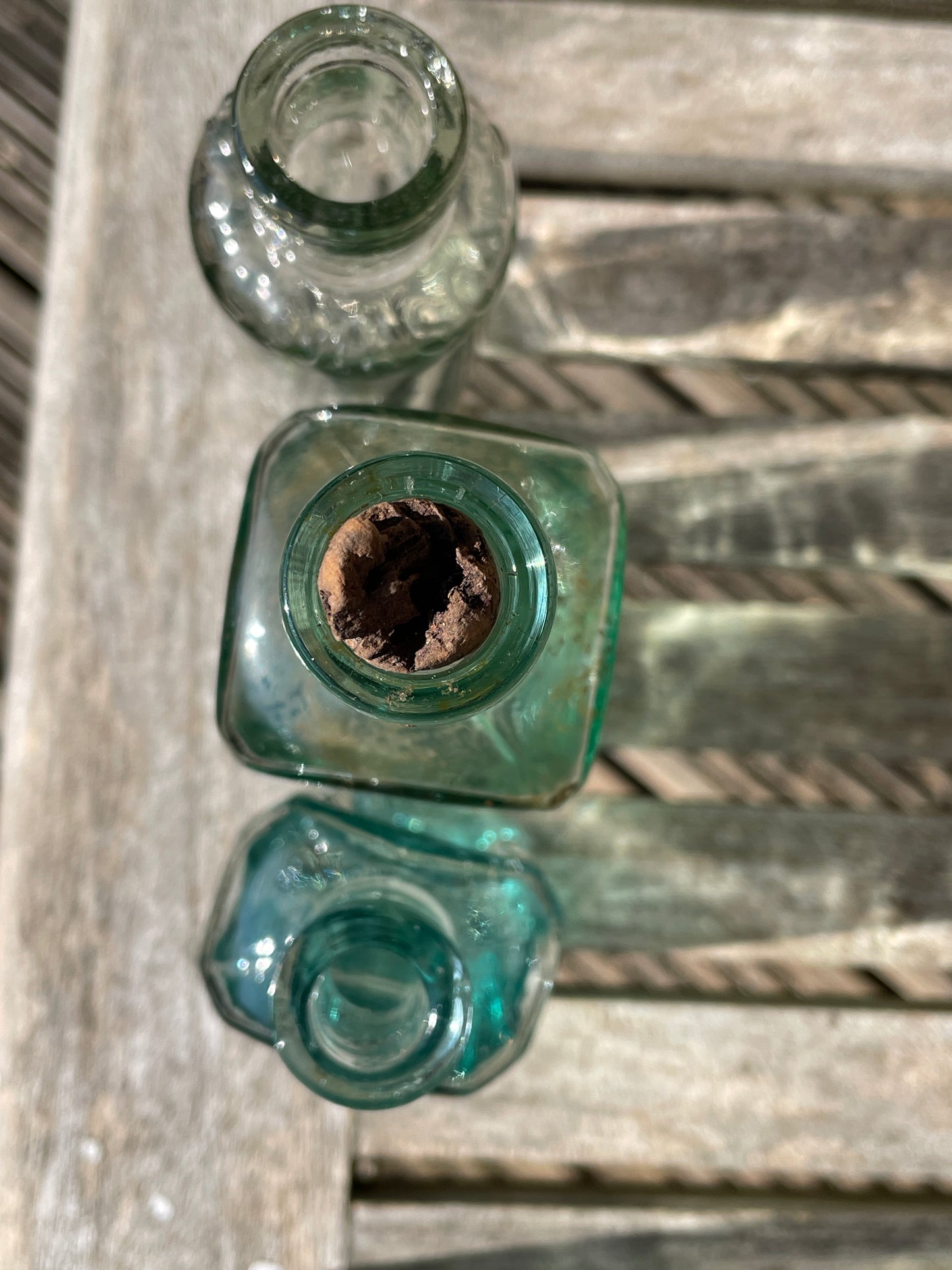 Five Antique and vintage small bottles incl. Masons Extract and Owbridge's Lung Tonic Hull examples