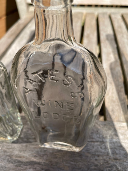 Yates's Wine Lodge  and two other long necked antique bottles
