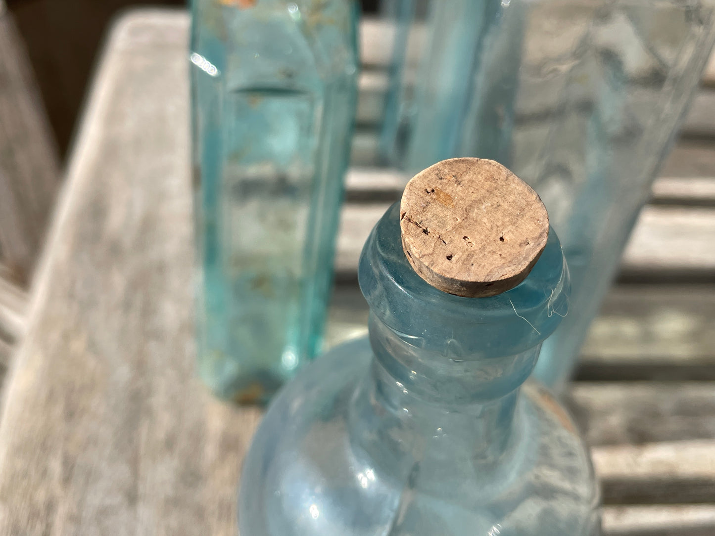 five Victorian pale blue antique Victorian bottles - Two ribbed examples tallest 16.5cm