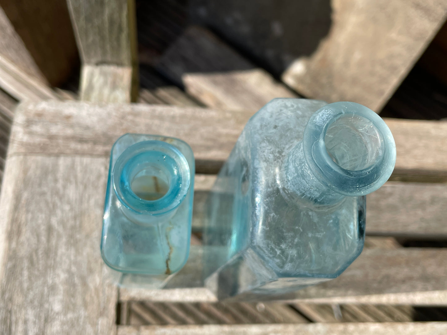 five Victorian pale blue antique Victorian bottles - Two ribbed examples tallest 16.5cm