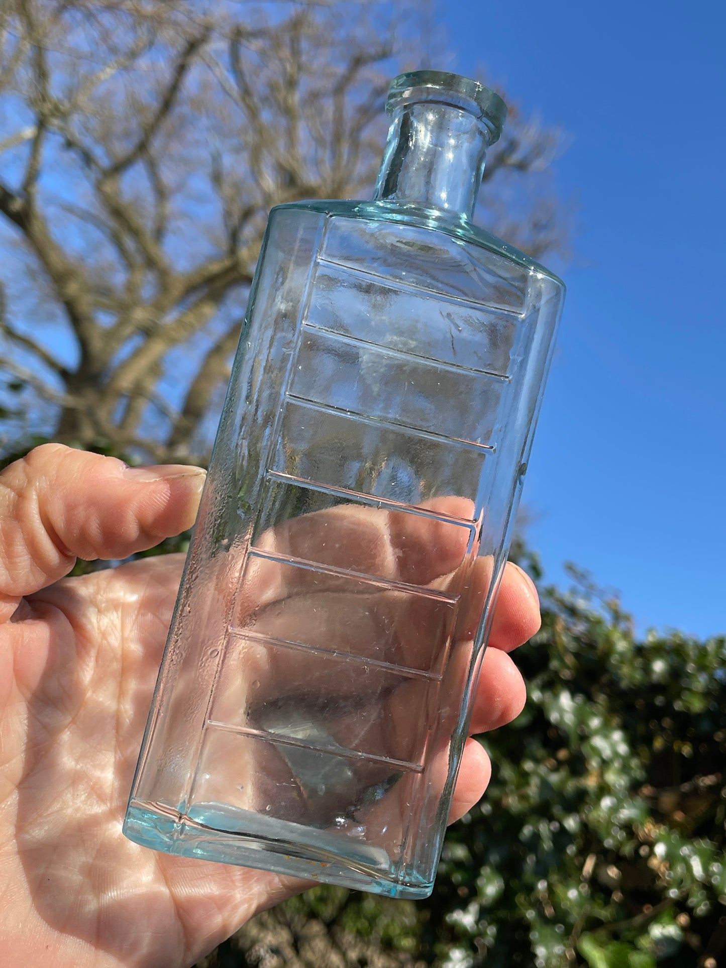 five Victorian pale blue antique Victorian bottles - Two ribbed examples tallest 16.5cm