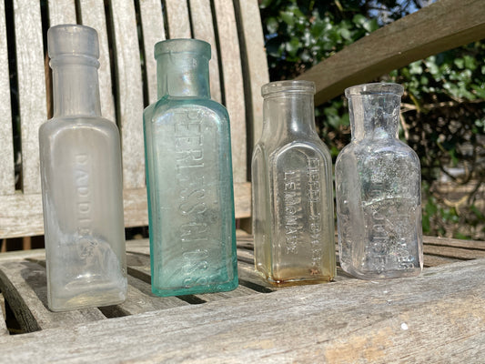 One Hauthaway's Peerless Gloss, Two Eiffel Tower and one Daddies sauce old bottles