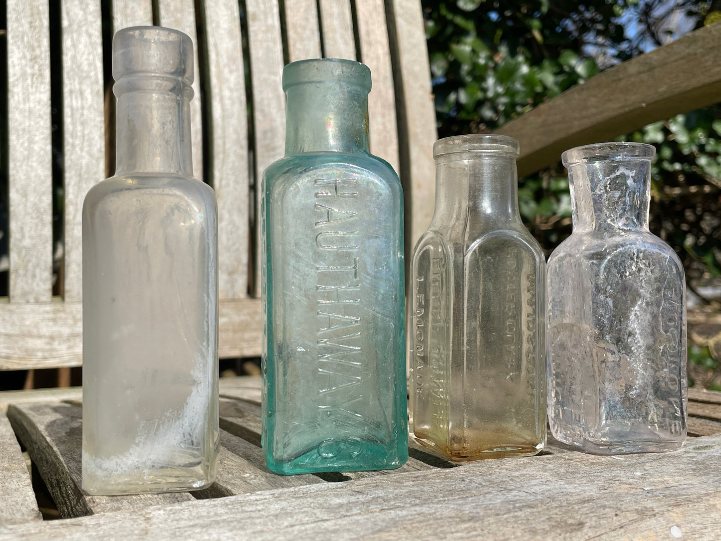 One Hauthaway's Peerless Gloss, Two Eiffel Tower and one Daddies sauce old bottles