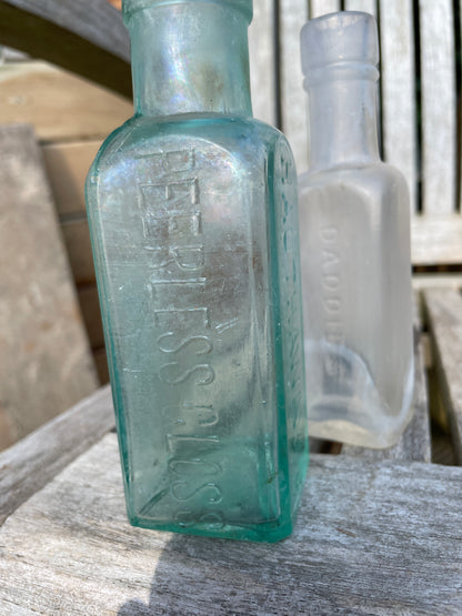 One Hauthaway's Peerless Gloss, Two Eiffel Tower and one Daddies sauce old bottles