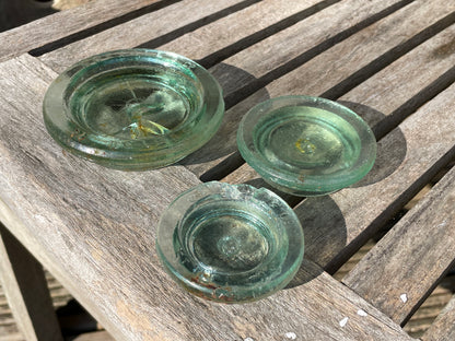 Two Nuttal and Co. St Helens glass jar lid and one other c1890
