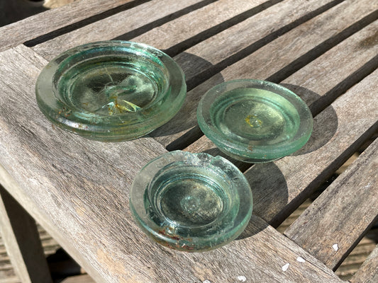 Two Nuttal and Co. St Helens glass jar lid and one other c1890