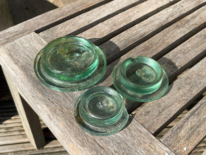 Two Nuttal and Co. St Helens glass jar lid and one other c1890