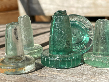 Five glass bottle stoppers one marked Prepared by Eno's Patent c1890's