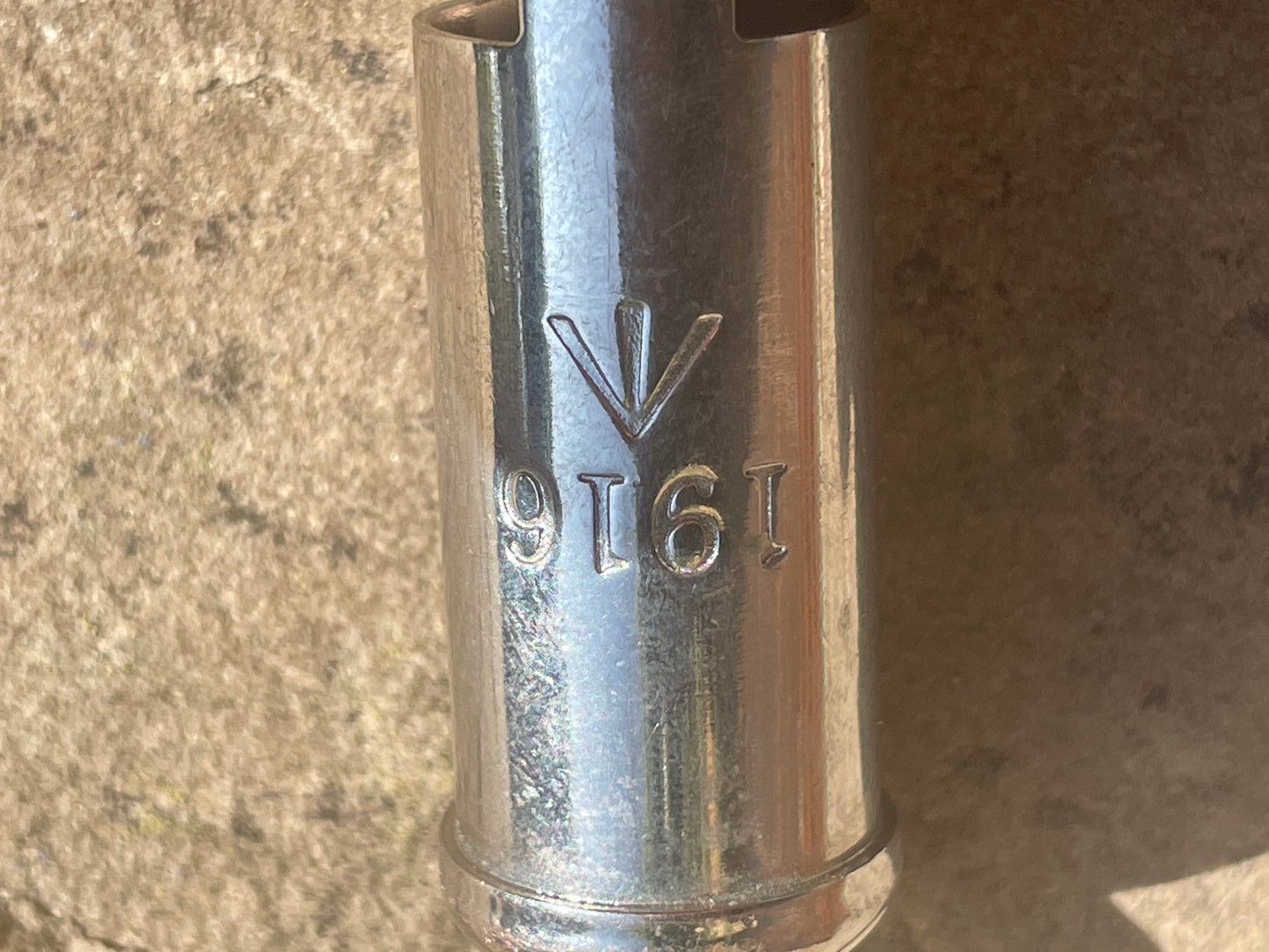 WW1 1916 antique trench whistle dated and marked with the army broad arrow mark