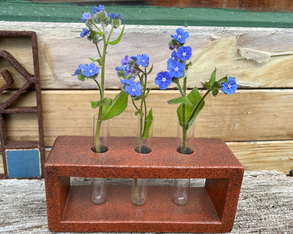 A Studio Pottery Glazed Brick-Form Test Tube Rack Vase