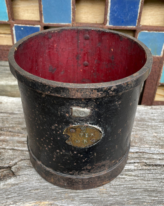 An Antique Iron Bound Two Litre Exchequer Measure, 15cm high x 15cm in diameter