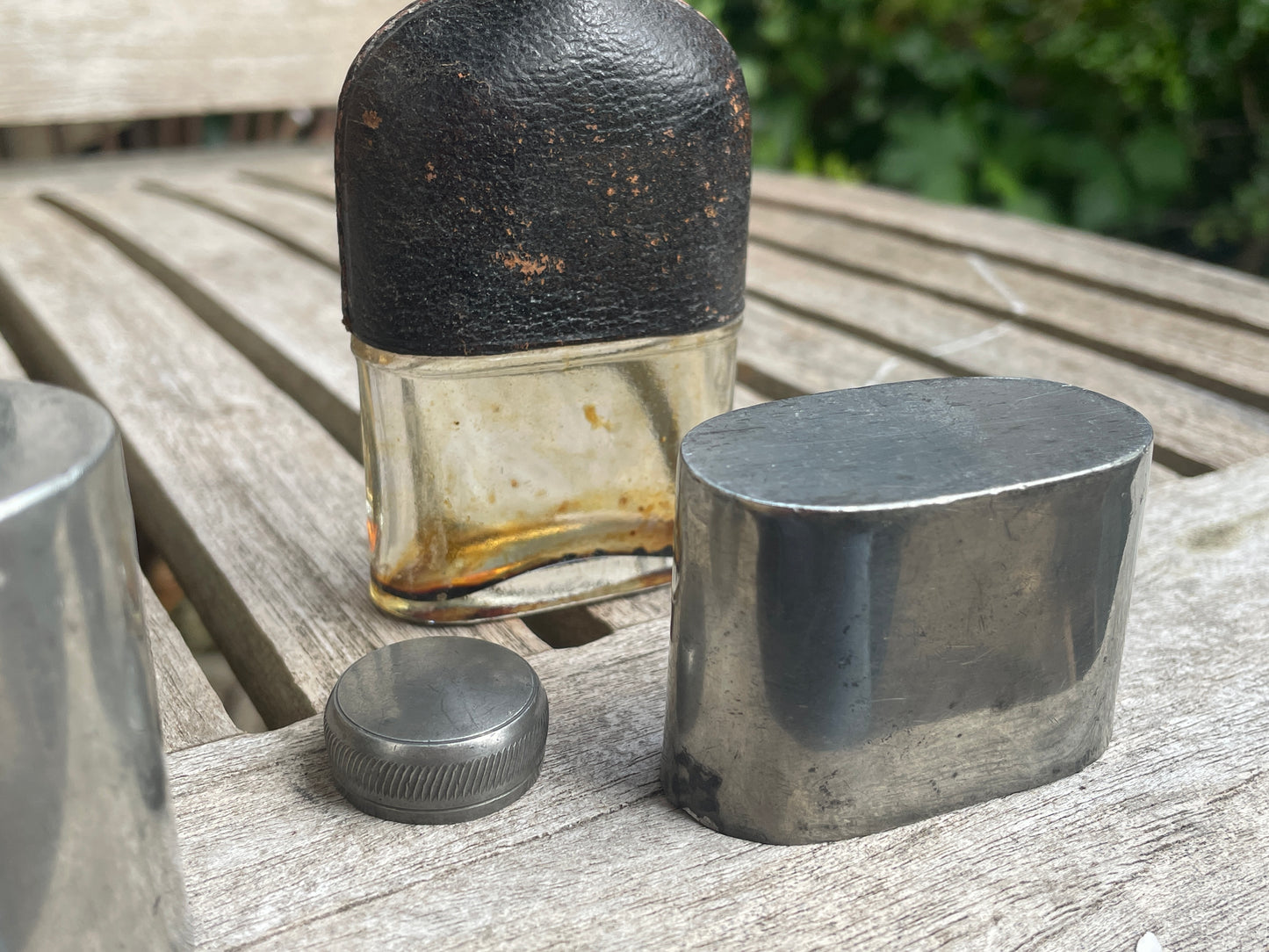 Pair of Vintage Leather & Metal Hip Flasks – Travel Companion Bottles with Removable Cups, Early to Mid 20th Century