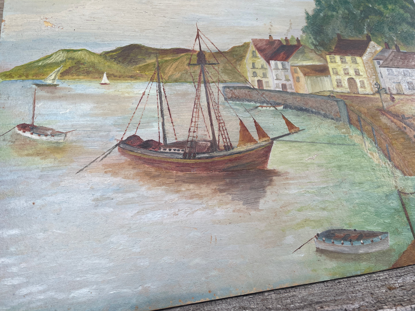 Naïve folk art oil on board painting of an English Harbour